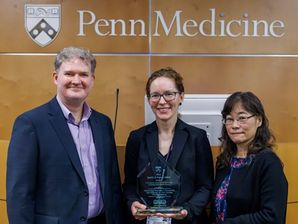 Dr. Torgersen (center) accepts the 2023 Penn Medicine Quality & Patient Safety Award.