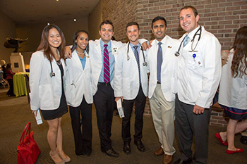 Group of first-years after donning their new white coats