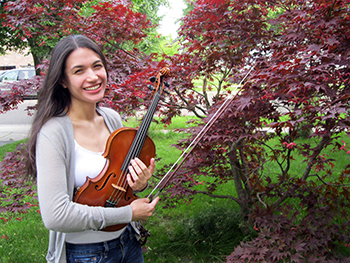 Dr. Chong pictured the week she graduated Penn Medicine, two weeks before her solo performance with the Lower Merion Symphony where she played the Sibelius Violin Concerto.