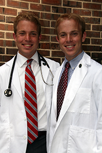 Greg Kennedy, M'17, and Will Kennedy, M'16, at Greg's White Coat ceremony on August 16, 2013.