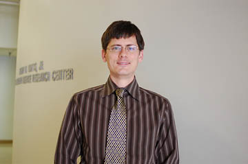 Toby standing in hallway of Neuroscience Research Center