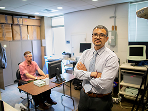 Photo Of Dr. Roy Hamilton In TMS Lab