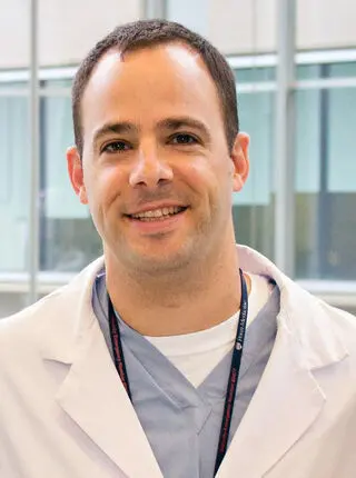 Terence Gade, M.D., Ph.D.