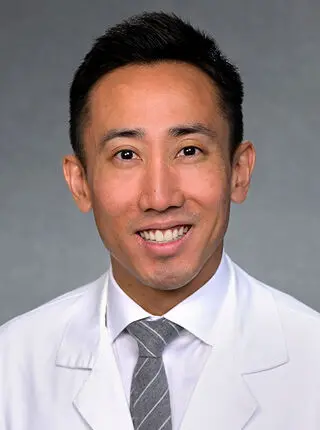 John T. Miura, MD