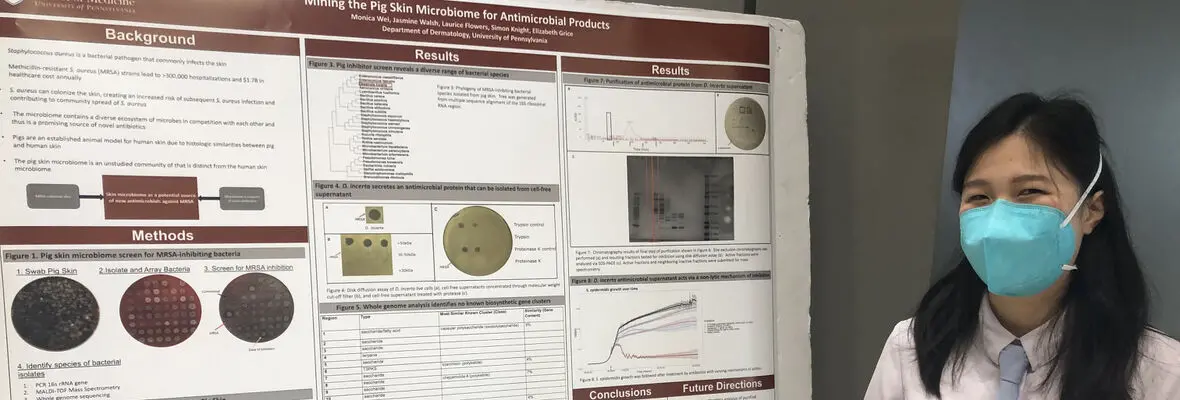 PhD candidate M Wei at a Conference