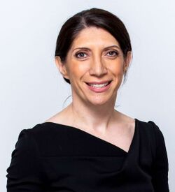 Dolores Hambardzumyan wearing black and light blue background