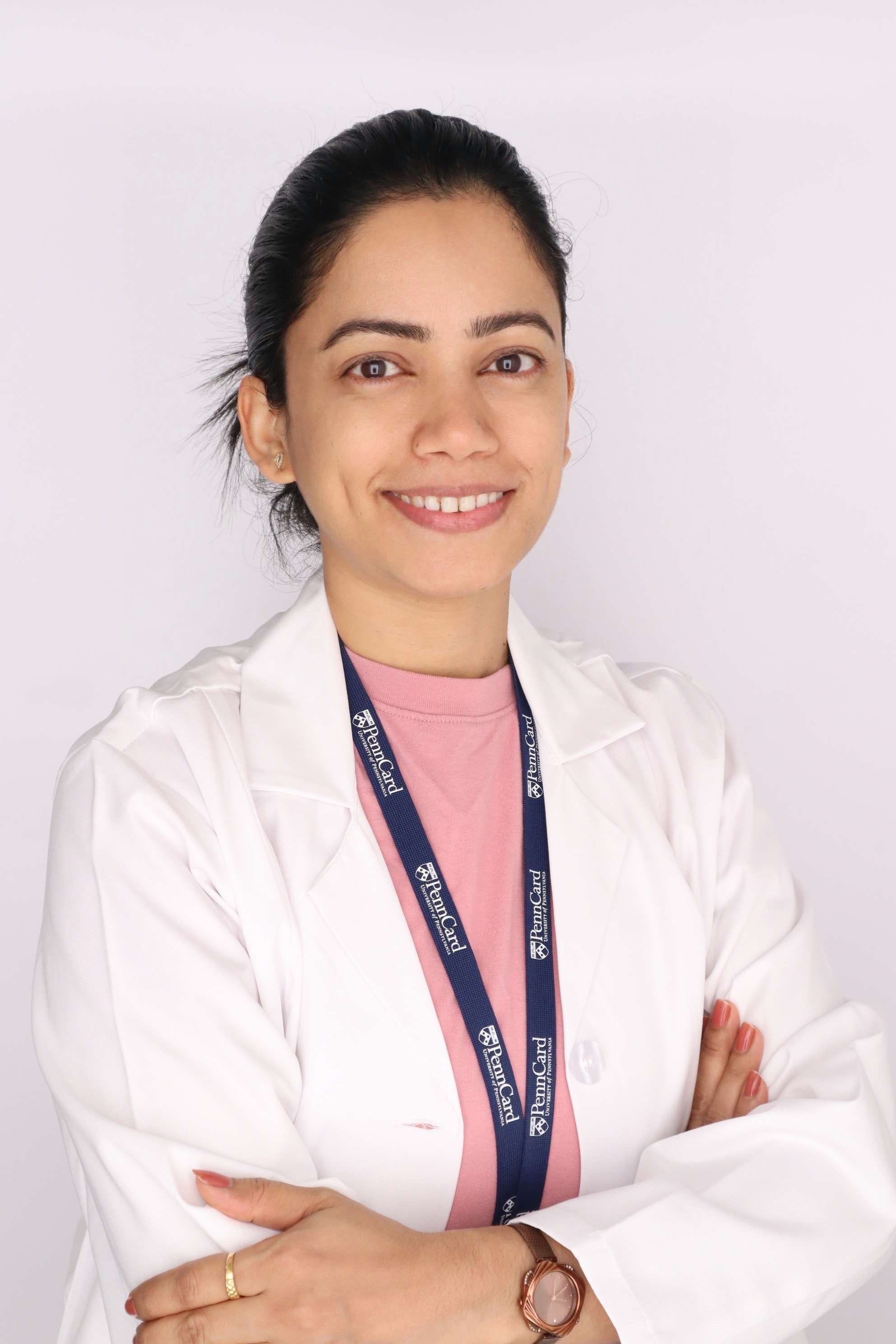 Kavita Rawat in a white coat with arms crossed