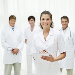 researchers in white coats