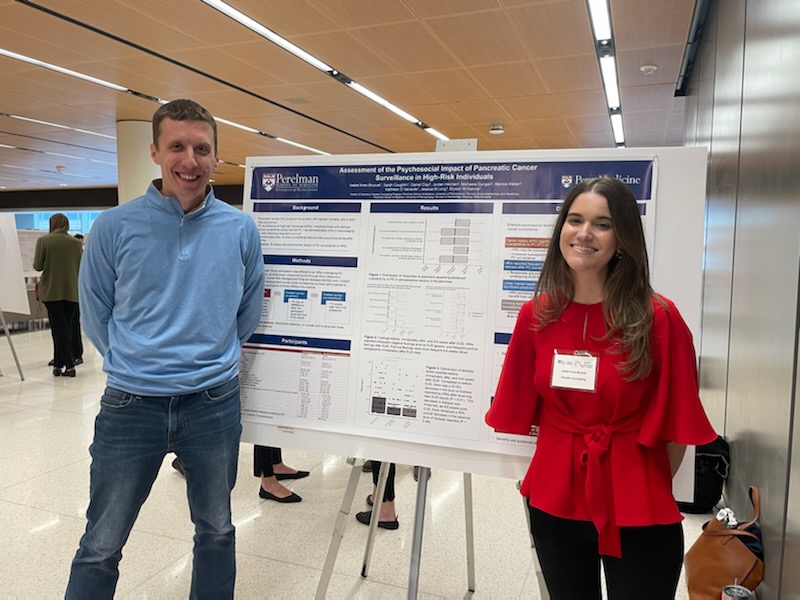 Isabel and Bryson at a research poster