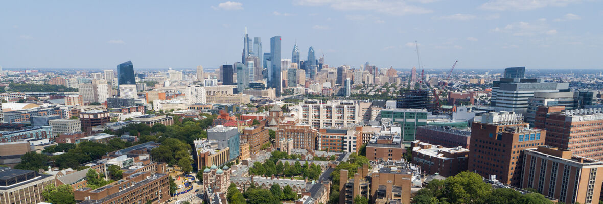 Image of Penn's campus and Philadelphia city skyline.