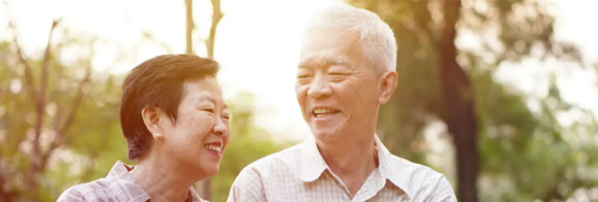 Eligibility Criteria Banner Senior Couple Smiling