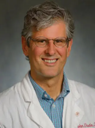 John E. Duda, MD