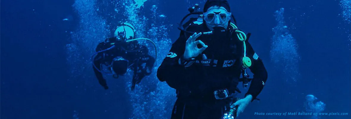 Undersea Divers. Photo courtesy of Pia B on www.pexels.com Photo courtesy of Maël Balland on www.pexels.com