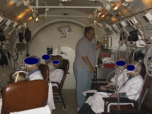 Reconfiguration of recliners in the chamber to allow up to 7 patients to be treated at a time.