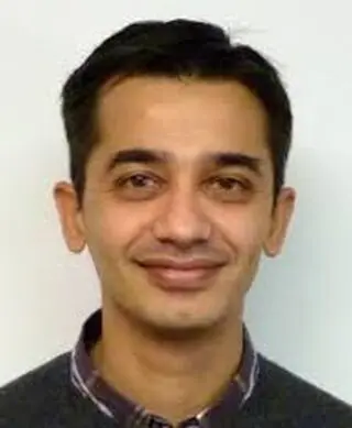 Suleman Surti, Research Professor