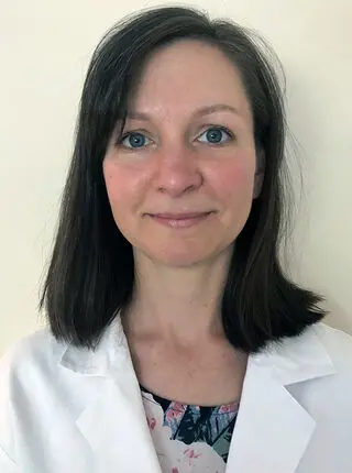 Caitlin A. White, MD