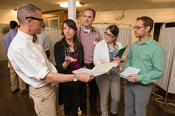 Dr. Brian Work, medical students Rebecca Abelman and Harrison Kalodimos, nursing student Jennifer DeVirgiliis, and Dr. Eric Goren.