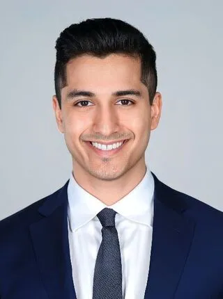 Mert Marcel Dagli, M.D., F.I.C.S.(Jr.)