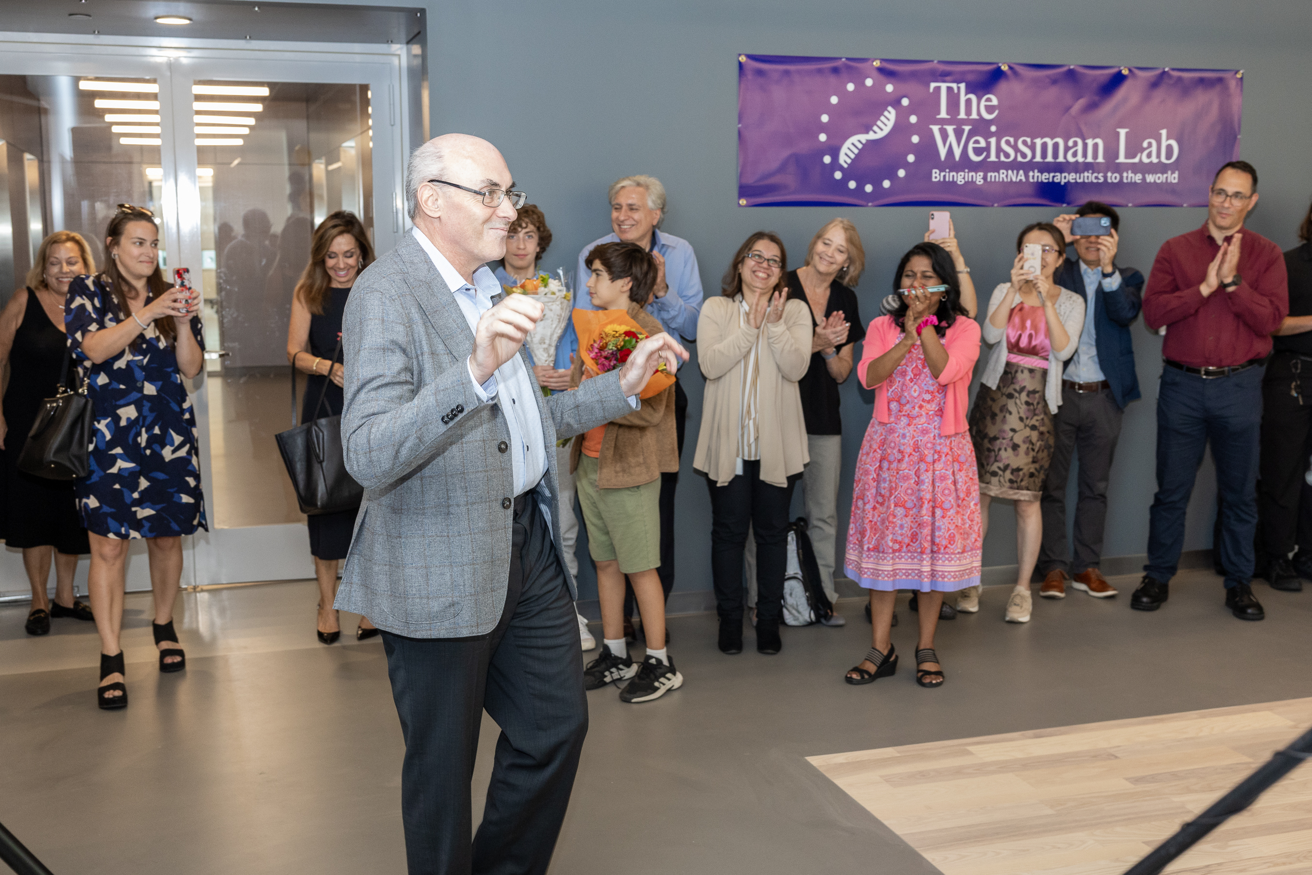 Drew Weissman walking into Weissman Lab