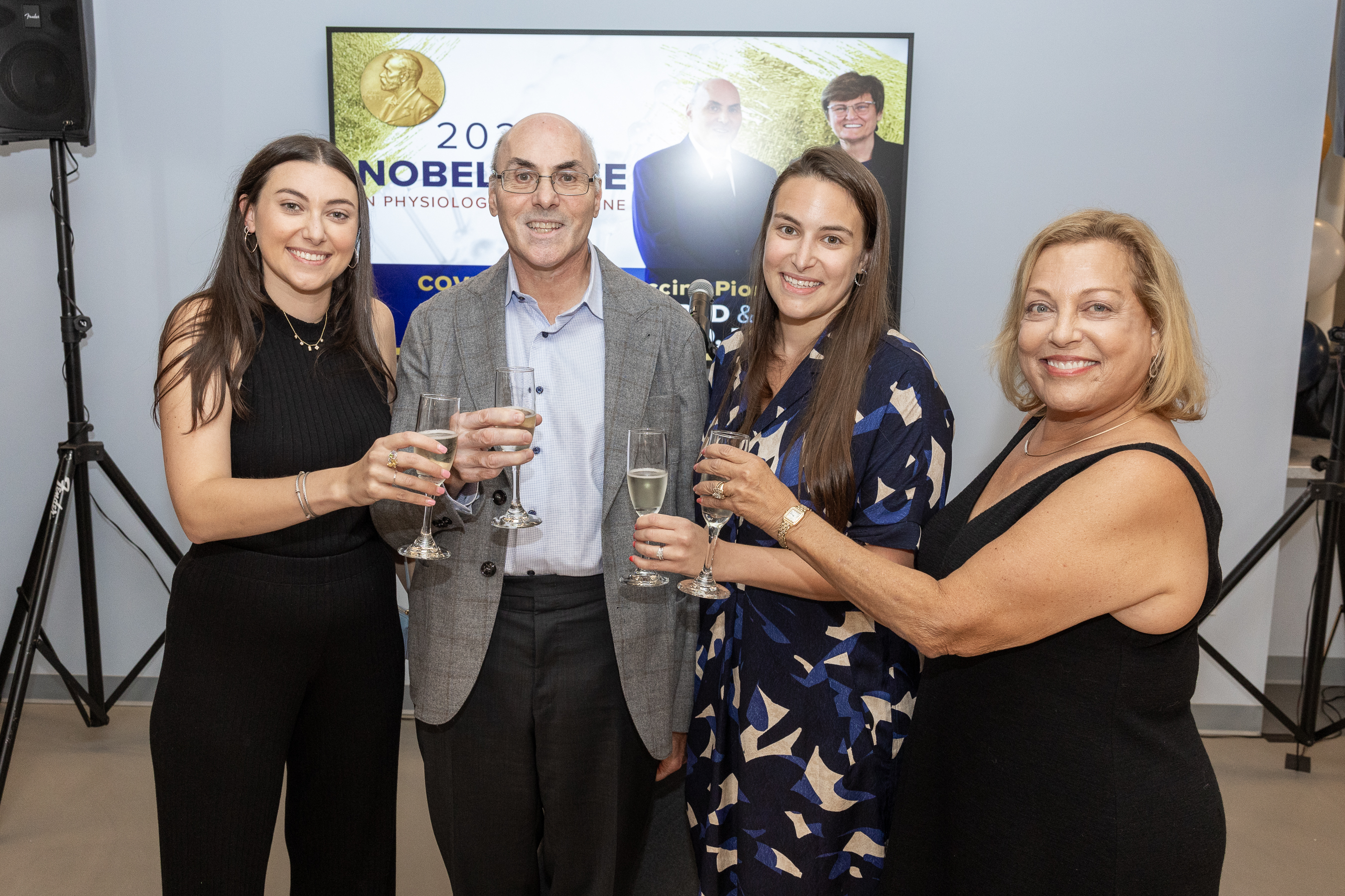 Weissman family toasting champagne