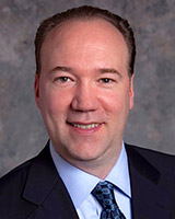 John A. Wolf, Ph.D.